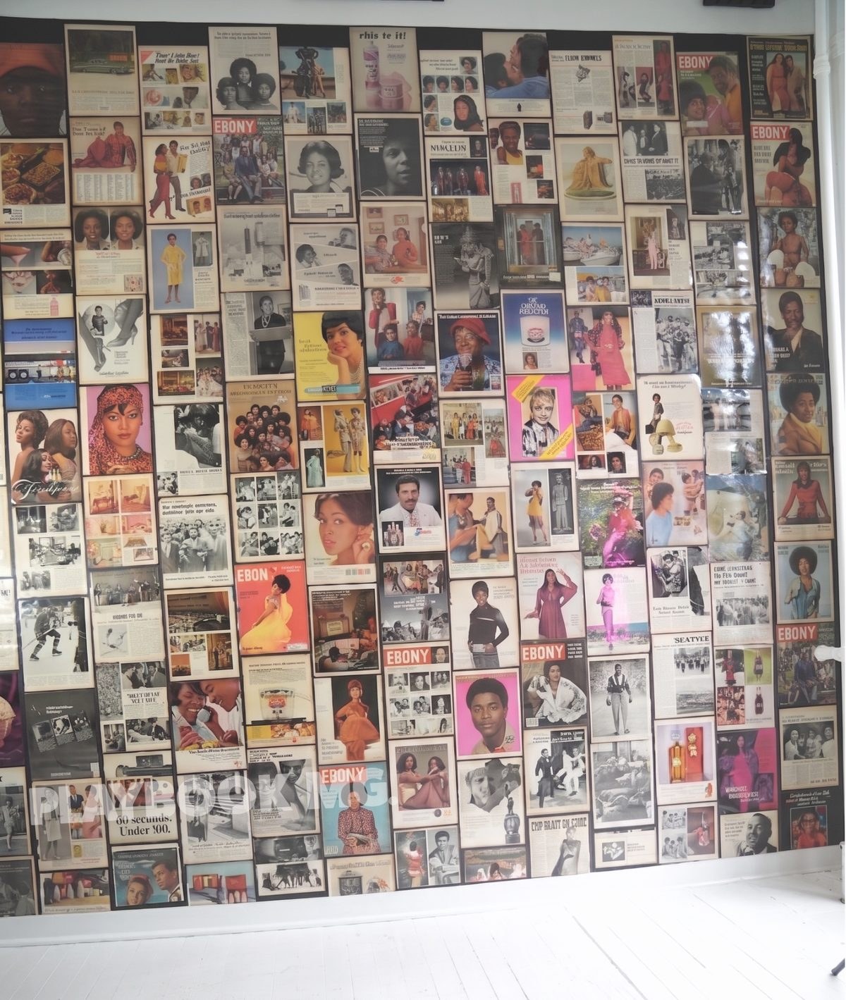 Archive wall of Black print media and advertising in the Playbook MG content studio, Industry City, Brooklyn.